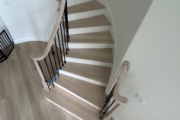 Match stained staircase and LPV floor.