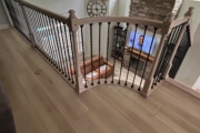 Match stained staircase and LPV floor.