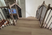 Match stained staircase and LPV floor.