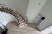Match stained staircase and LPV floor.