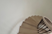 Match stained staircase and LPV floor.