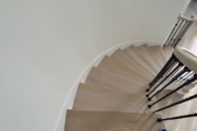 Match stained staircase and LPV floor.