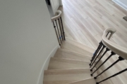 LVP flooring installed and match stained staircase by Dan's Floor Store 904.887.8303.